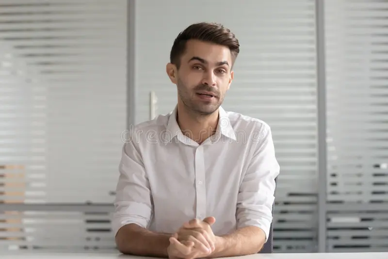 concentrated male hr manager holding video distant job interview young confident businessman looking camera talking to client 157941139